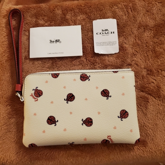 Coach Handbags - 🥂COACH LADYBUG WRISTLET NWT